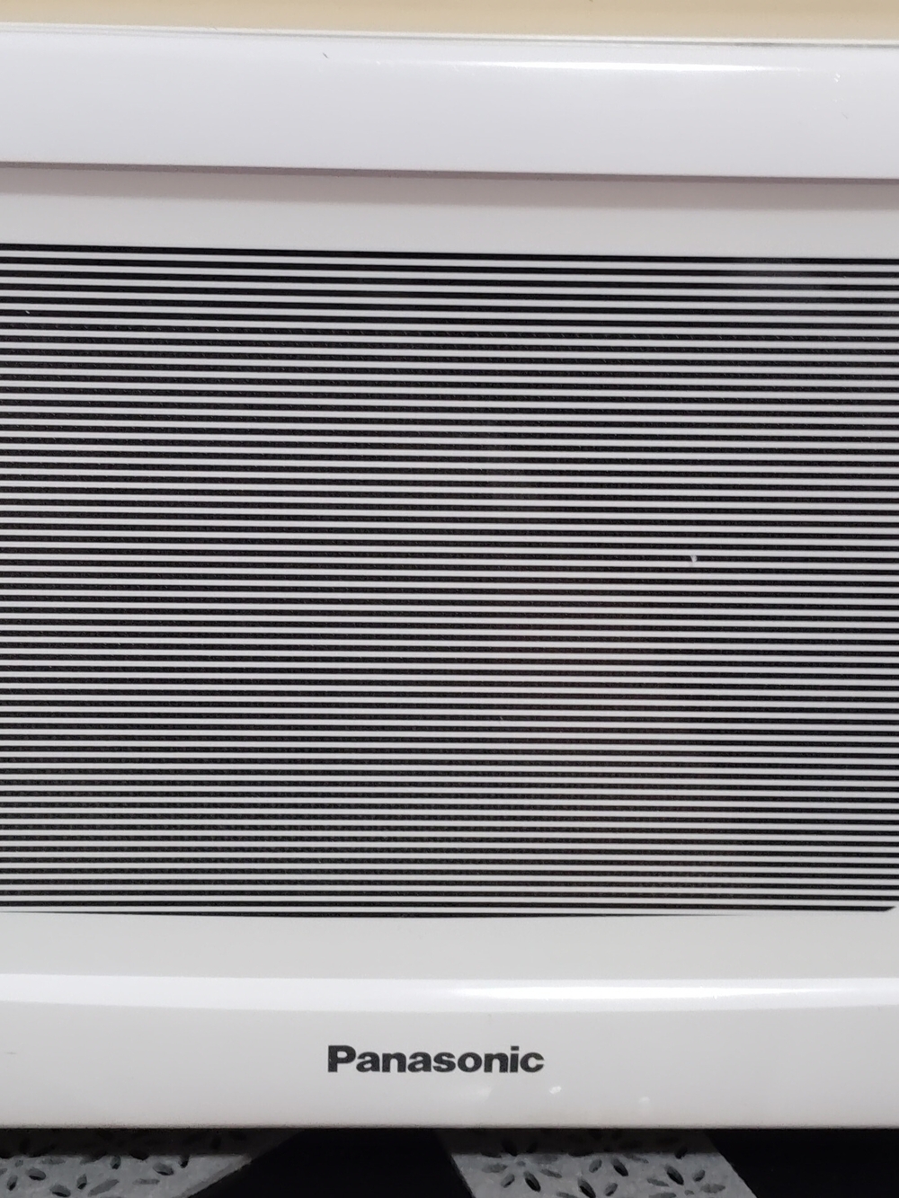 Panasonic White Compact Appliance with Black Grill